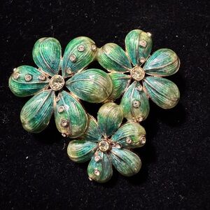 Vintage Monet Green Floral Brooch In Gold Tone Setting With Clear Rhinestones